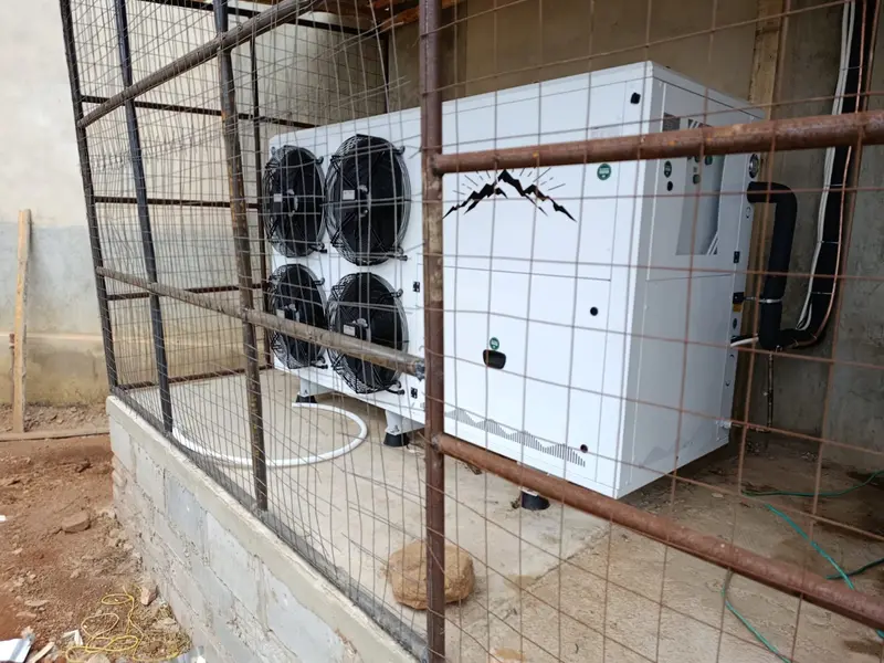 Commercial air-conditioning chiller with four fans installed in a security cage
