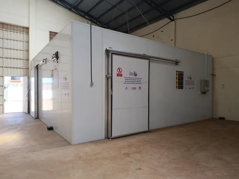 Completed warehouse cold storage room for The Fresh Products with sliding doors and control box