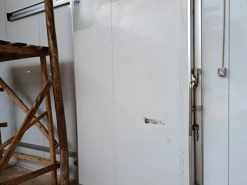 Heavy-duty insulated sliding door on a walk-in coldroom
