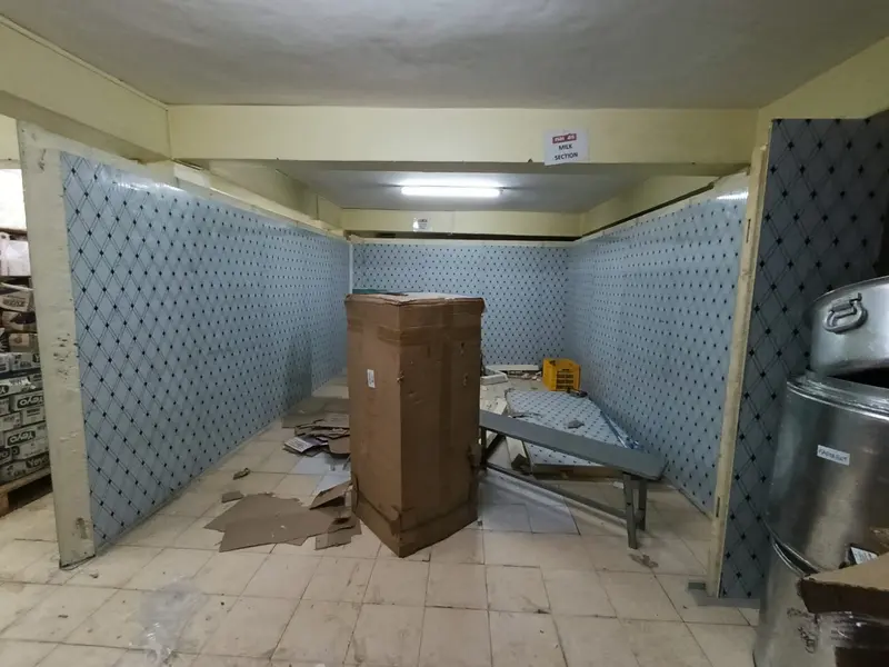 Supermarket milk-section cold storage room during panel installation