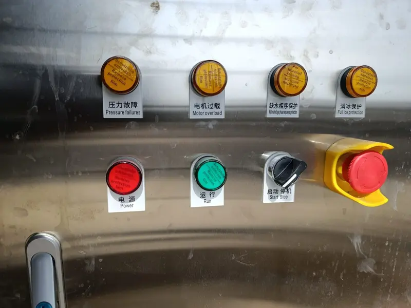 Stainless-steel ice flake machine control panel with start-stop and emergency stop