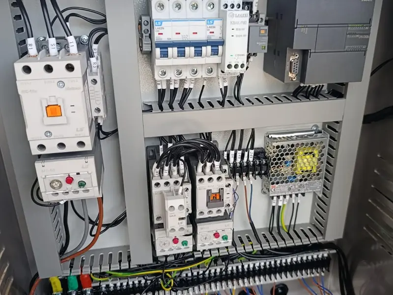Siemens PLC refrigeration control panel with labelled contactors and wiring